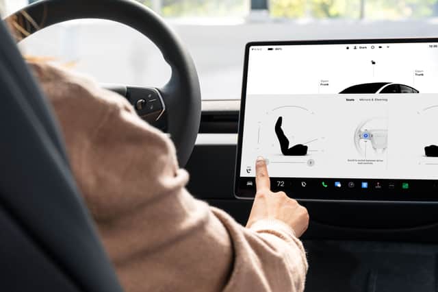 The touch-screen is as good as ever, but there isn't one in the back in the RWD version