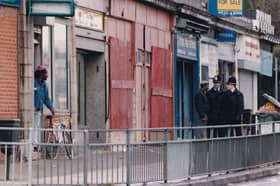 Street cred in March 1994. Police, who are part of the Community Project Team at Chapeltown Police Station , talk to local residents on Chapeltown Road.