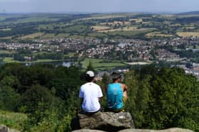Visitors look out over Surprise View on Otley Chevin