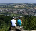 Visitors look out over Surprise View on Otley Chevin