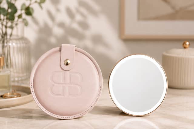 Beautifect Glow Compact slips easily into your handbag, combining a slimline mirror with built-in LED lighting for quick makeup touch-ups wherever you are.