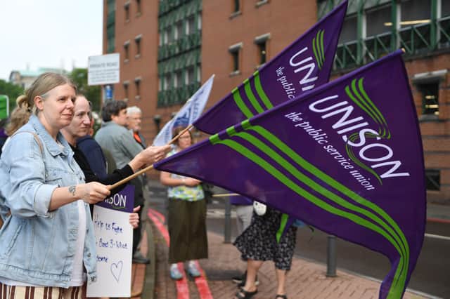 Pictured theatre assistants employed by Leeds teaching Hospitals NHS Trust out on the picket lines outside the LGI, Leeds.