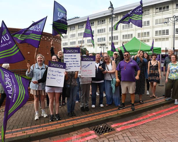 Pictured theatre assistants employed by Leeds teaching Hospitals NHS Trust out on the picket lines outside the LGI, Leeds.