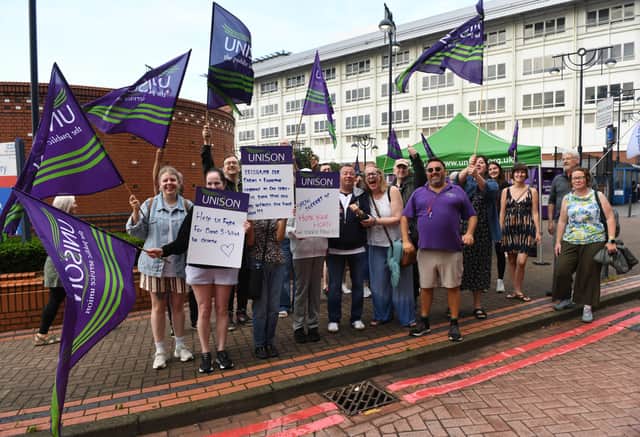 Pictured theatre assistants employed by Leeds teaching Hospitals NHS Trust out on the picket lines outside the LGI, Leeds.