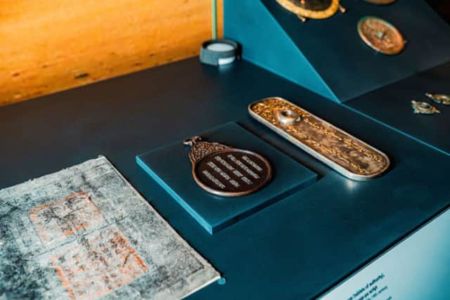 Paper money of the Yuan Dynasty (National Museum of Mongolia), Gerege (tablets of authority), one with Phags-pa script (Chinggis Khaan National Museum).