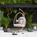 Sydney Rope Folding Egg Chair includes a plush cushion and can be folded to make seasonal storage more convenient