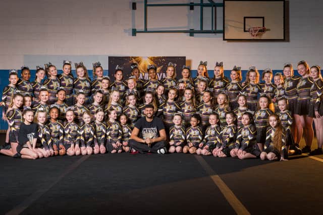 Traitors star Theo founded Leeds cheerleading club Mayne Allstars in 2018.