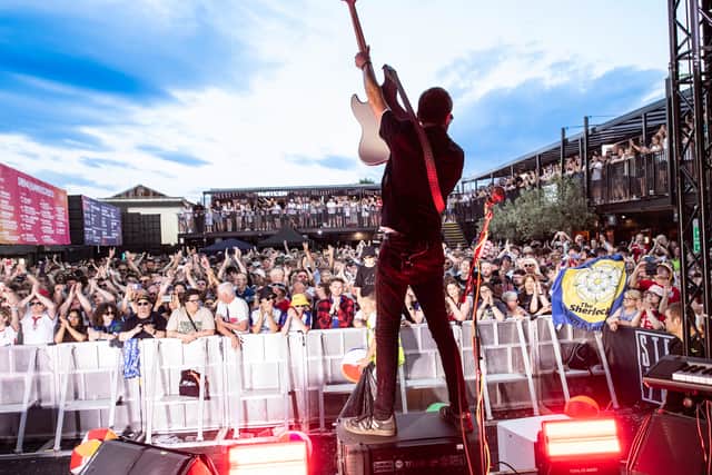 Bassist Trent Jackson salutes a packed Sheffield SteelYard.