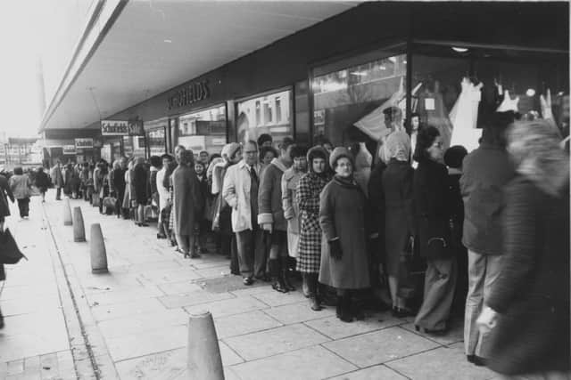Part of the long queue for the sale at Schofields department store, on The Headrow, Leeds, in January 1976