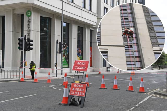 A broken window on the 28th floor caused road closures on Monday.