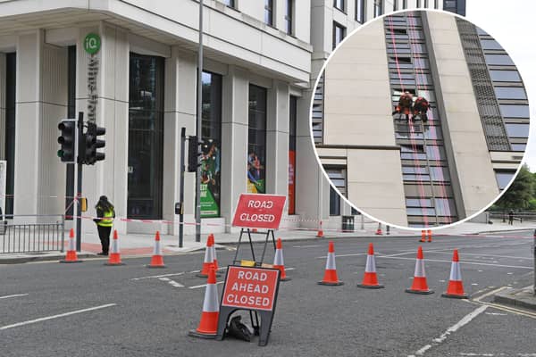A broken window on the 28th floor caused road closures on Monday.