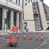 A broken window on the 28th floor caused road closures on Monday.