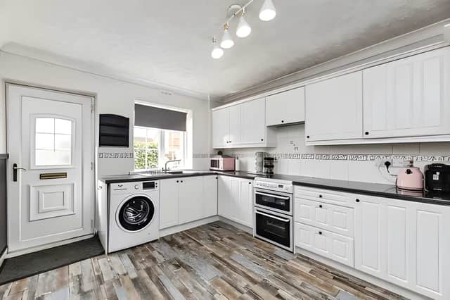 The kitchen diner is creates a practical hub where family meals and everyday routines come together with ease.