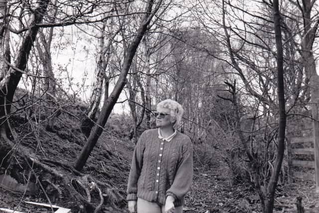 June Norcliffe walks on the neglected Roman road in March 1989.