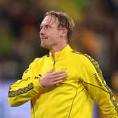 Leeds United target Julian Brandt appears to be weighing up his options.