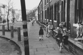 Children playing on  Burley Lodge Road in October 1970.
