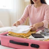 From tech to fashion and beauty staples, these are the products worth packing when you travel. Photo posed by model.