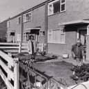Beattie Turner, front, in the fenced off garden  of her Stanks Drive home with Kathleen Olbison in October 1983.