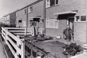 Beattie Turner, front, in the fenced off garden  of her Stanks Drive home with Kathleen Olbison in October 1983.