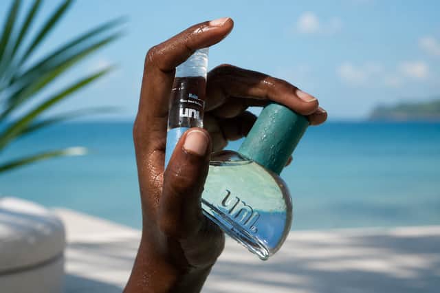 The distinctive rounded bottle of Uni Rain Eau de Parfum reflects the fragrance's clean, fresh character, with rain-inspired notes of peony, oakmoss and citrus.