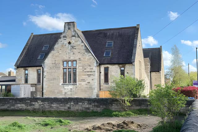 This distinctive village home makes a memorable first impression before revealing its spacious family-focused interior.