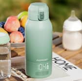 The Momcozy Portable Bottle Warmer is designed to make warming baby feeds easier while travelling