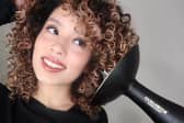 The Curlsmith Defrizzion Hair Dryer includes an extra-large diffuser designed to help define curls while reducing frizz