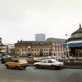 Eastgate roundabout from the direction of St. Peter's Street in March 1983. Circle House is on the left and the Marquis of Granby public house in the centre. A petrol filling station occupies the centre of the roundabout.