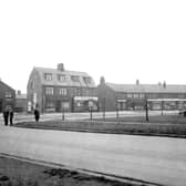 A parade of shops on left hand side of Middleton Park Circus in November 1933.