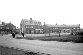 A parade of shops on left hand side of Middleton Park Circus in November 1933.