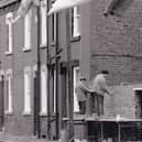 March 1990 and work had begun on demolishing outside toilets.