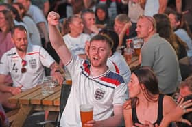 Fans celebrate at the Kirkstall Bridge Inn in Leeds