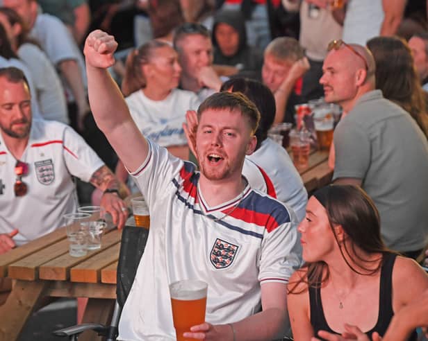 Fans celebrate at the Kirkstall Bridge Inn in Leeds