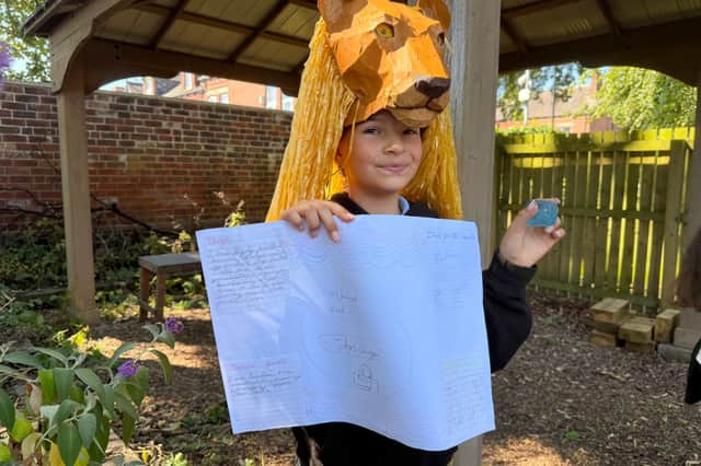 La-niyah Fuller chose to bury a lion mask in homage to the school's production of Madagascar.