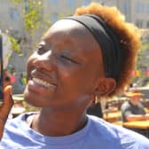Sahara Akeno  enjoys her free can of Leeds 400 beer from Kirkstall Brewery during a birthday picnic with live music.