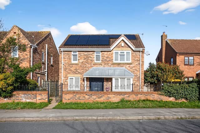 The attractive detached home combines smart kerb appeal with practical family features including off-street parking and a double garage.
