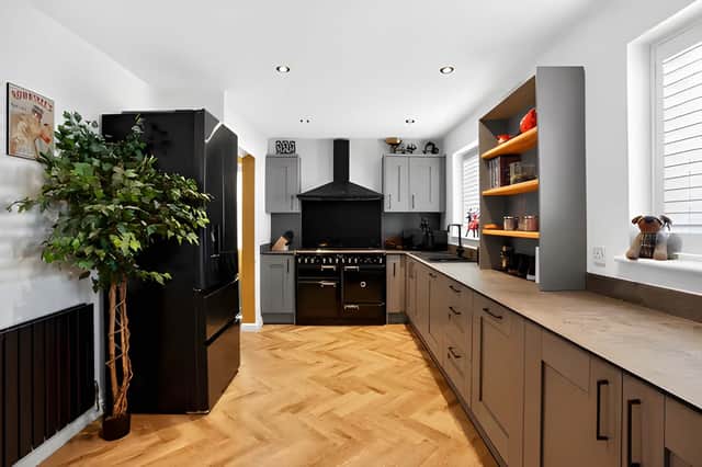 The impressive kitchen diner has been designed as the social heart of the home, blending everyday practicality with contemporary style.