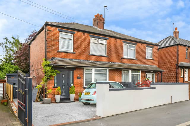 Smart kerb appeal and off-road parking create an inviting first impression at this Leeds home