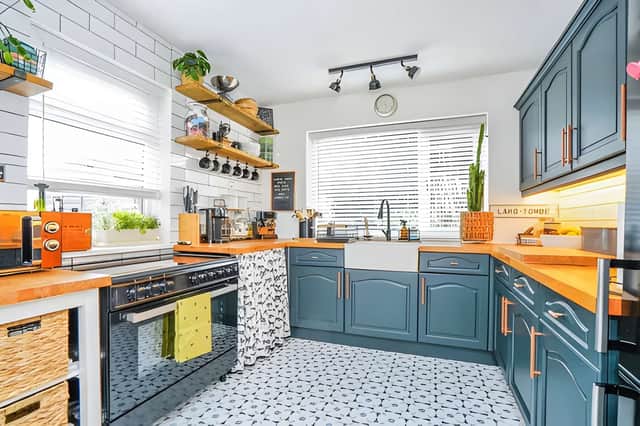 The shaker-style kitchen diner creates a welcoming hub for everyday family life and entertaining alike.