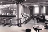 Inside The General Wade which opened in October 1965  and was the first stage of a new hotel scheme at the Merrion Centre by the Rank Organisation.  A glazed bridge connected the first floor lounge bar to the reception area of the new hotel which opened in January 1966.