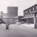 The upper precinct of the Seacroft Shopping Centre in October 1965. In the background is a 17-storey block of flats.