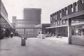 The upper precinct of the Seacroft Shopping Centre in October 1965. In the background is a 17-storey block of flats.