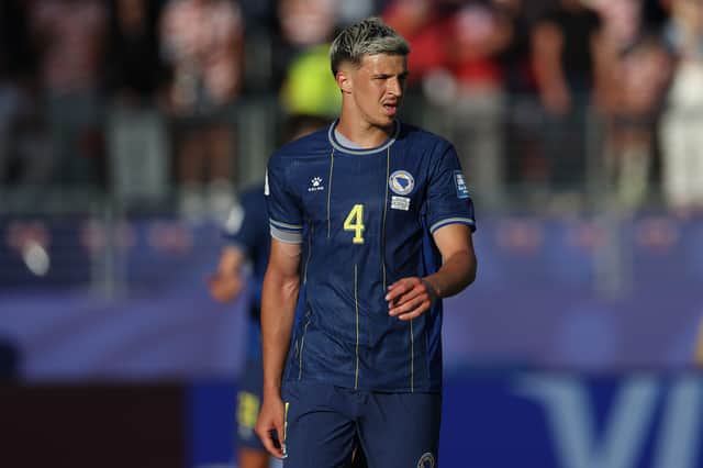 Tarik Muharemovic was on World Cup duties with Bosnia and Herzegovina.