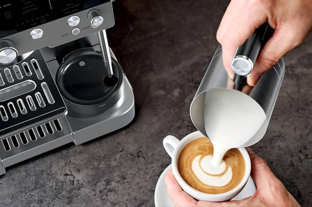 The Ninja Luxe Café Premier Espresso Machine in grey is designed to make espresso, cappuccinos and lattes with automated brewing features.