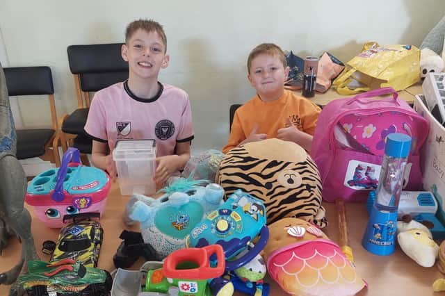 Younger members of the Cottingley community centre have held jumble sales to help raise funds