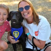 Shelley Thompson and Karis, nine, with their dog Lucas - the Leeds United fan who won waggiest tail.