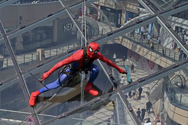 Spider-Man scaled the glass dome at Trinity Leeds