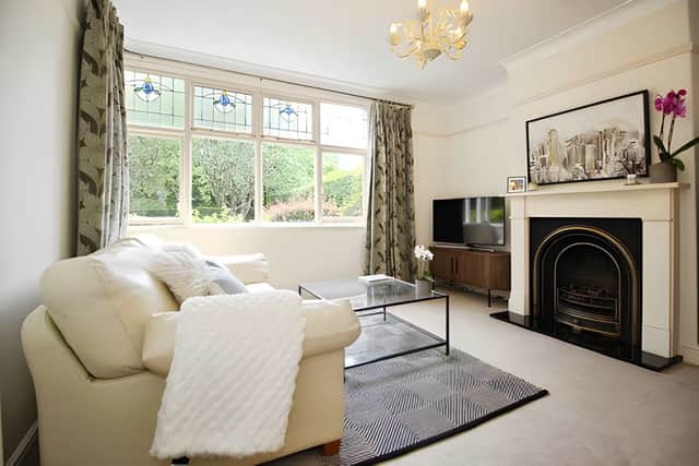 Original character and a welcoming gas fire help make the lounge an inviting retreat at the heart of the home.