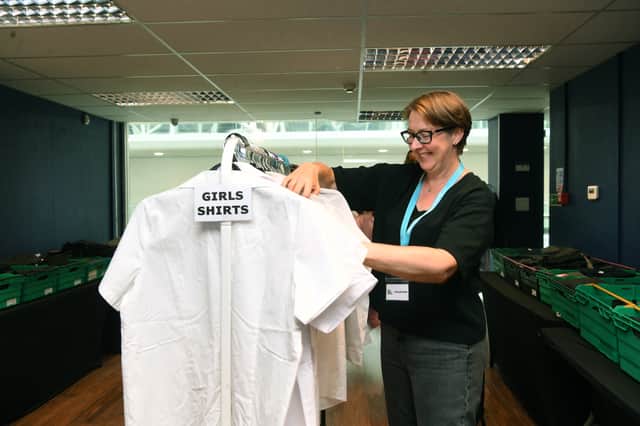 Volunteer Veronica Dilley at the Leeds School Uniform Exchange
