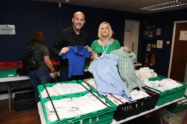 James Broughton, Town Centre Securities PLC and Tracy Morgan, Wear and Share Leeds, at the Leeds School Uniform Exchange